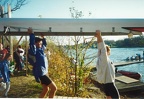 Doug Rathburn and Scott Atkinson carrying the North Country to the water